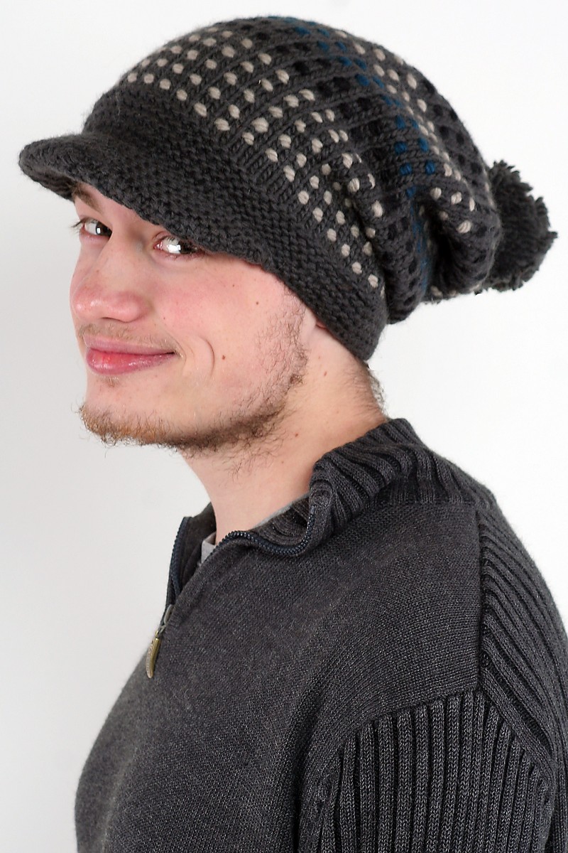 Handgestrickte Slouch-Bommelmütze mit Schirm aus Merinowolle – Songlines, Dunkelgrau/Petrol